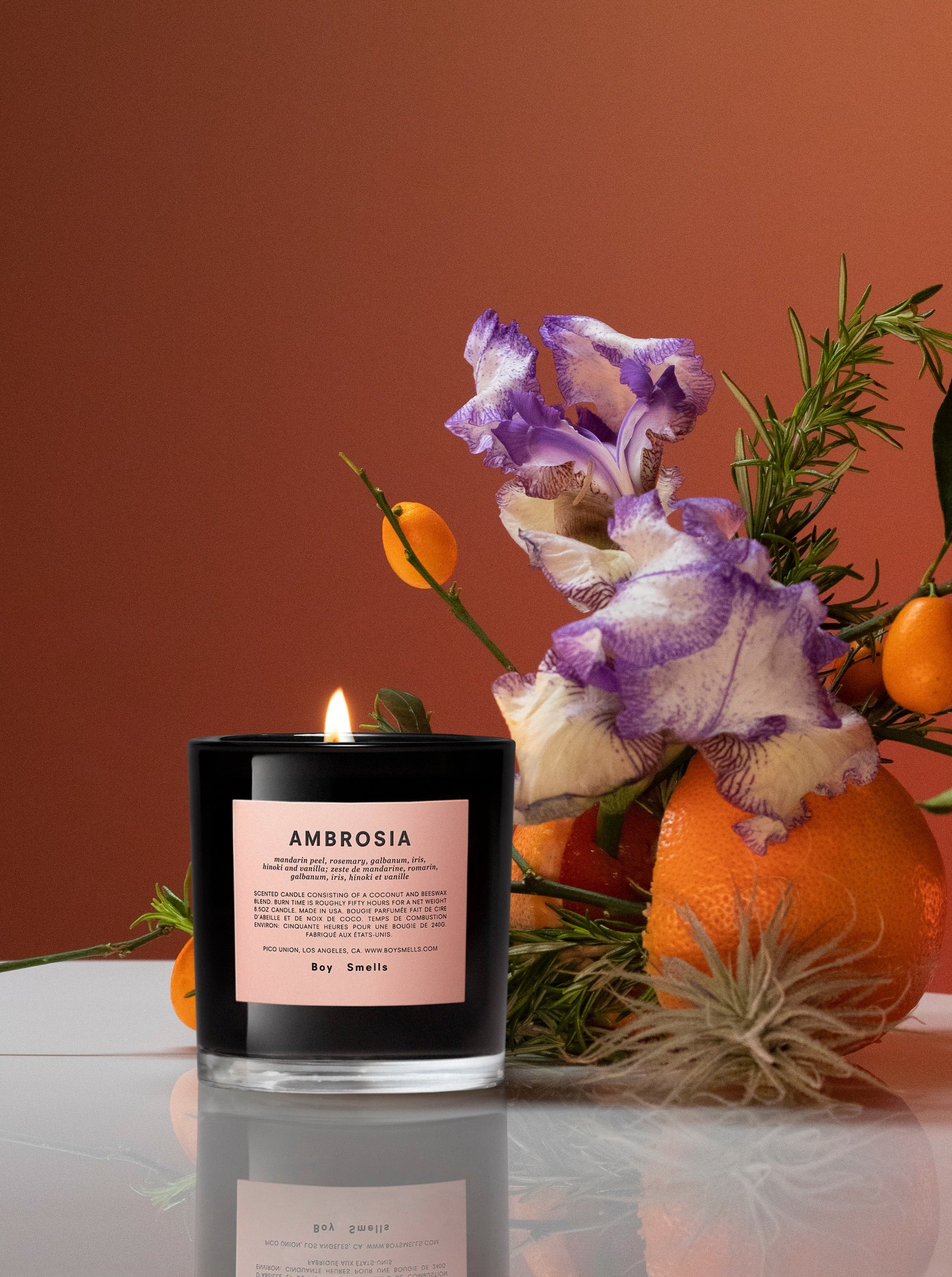 Boy Smells Ambrosia Candle Lifestyle Picture