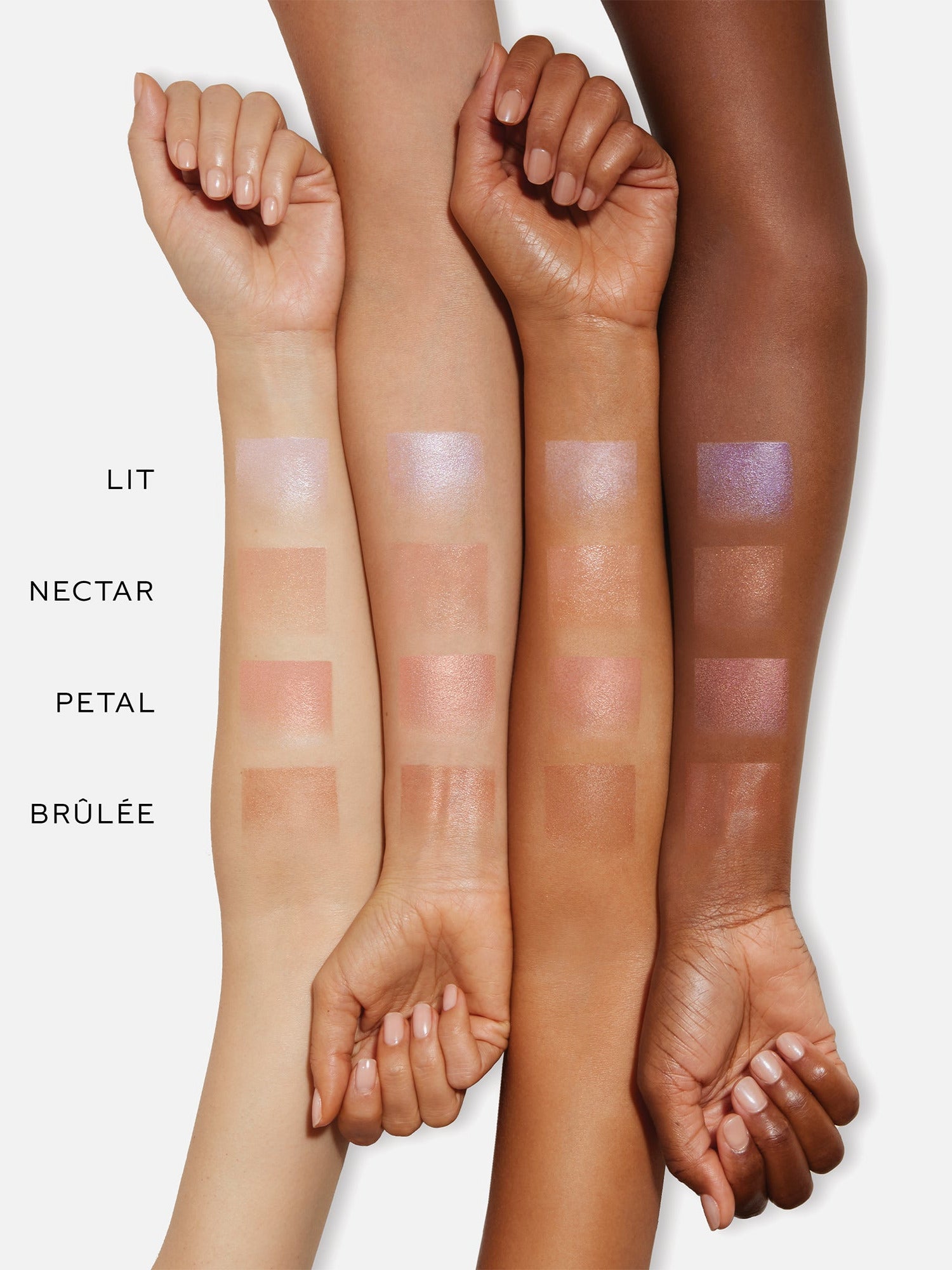 Westman Atelier Lit Up Highlight Stick swatches on four arms